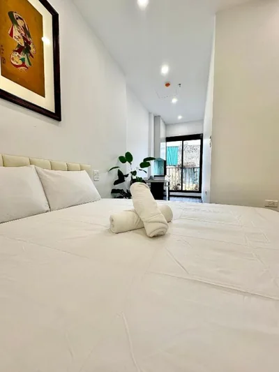 발코니가 있는 스위트룸 — Hanoi Iris Homestay - Manage by The Vesta